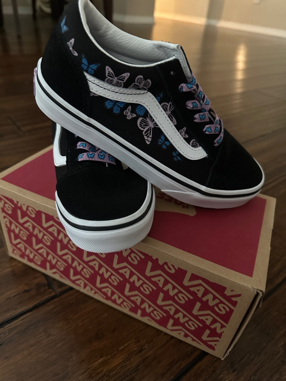 Vans Black Low-Top Sneakers with Blue and Pink Butterfly Accents